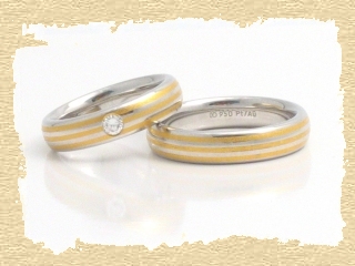 Partnerringe aus 750/Wei- und Gelbgold mit Diamant